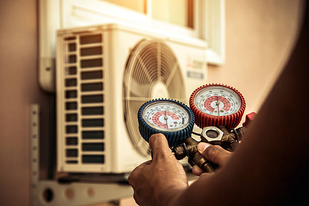 Professional Air Conditioning Service technician working in Alma, GA